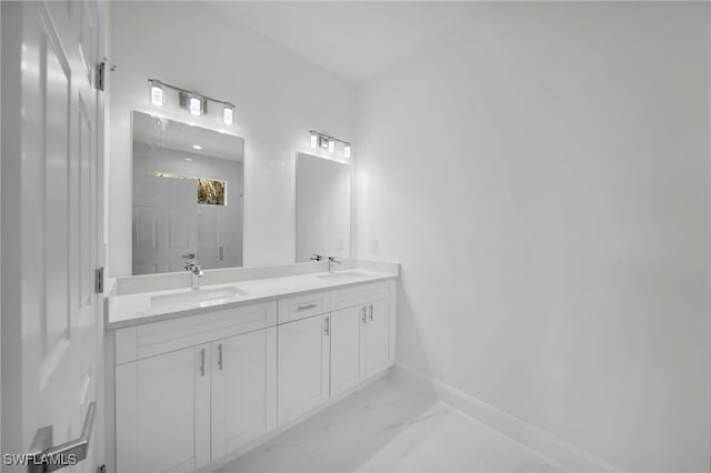 2817 22nd St W, Lehigh Acres, FL 33971 - full bath with double vanity, marble finish floors, and a shower with shower door