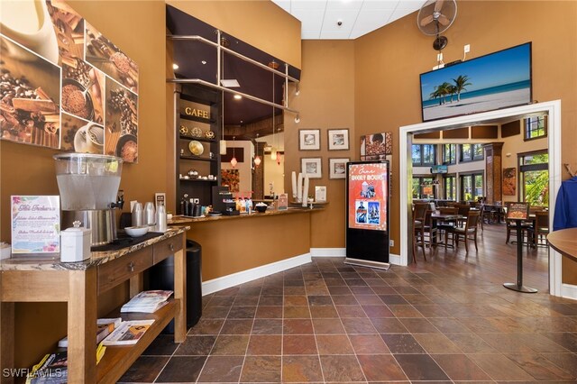 11999 Palba Way Unit 6405, Fort Myers, FL 33912 - reception with a high ceiling and a surveillance system