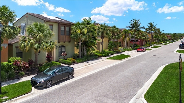 11999 Palba Way Unit 6405, Fort Myers, FL 33912 - view of asphalt street featuring sidewalks, curbs, and a residential view