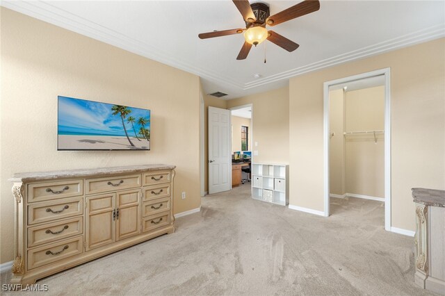 11999 Palba Way Unit 6405, Fort Myers, FL 33912 - bedroom featuring light carpet, a walk in closet, a ceiling fan, and crown molding
