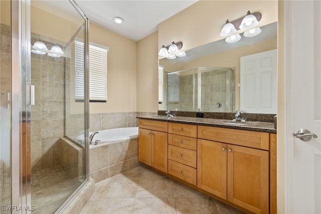 11999 Palba Way Unit 6405, Fort Myers, FL 33912 - full bathroom featuring double vanity, a stall shower, a garden tub, and tile patterned floors