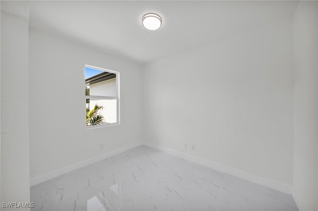 2511 23rd St W, Lehigh Acres, FL 33971 - unfurnished room with marble look tiles