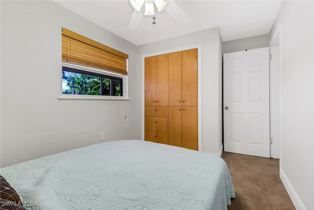 5251-5253 Serenity Cv, Bokeelia, FL 33922 - bedroom featuring tile patterned floors, a closet, and ceiling fan