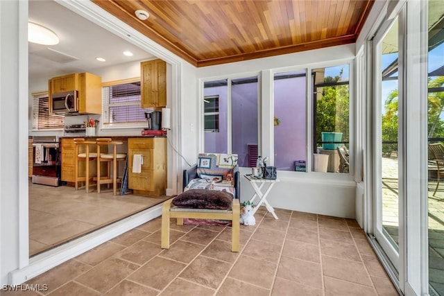 5251-5253 Serenity Cv, Bokeelia, FL 33922 - view of sunroom / solarium