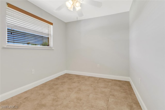 5251-5253 Serenity Cv, Bokeelia, FL 33922 - empty room with a ceiling fan and baseboards