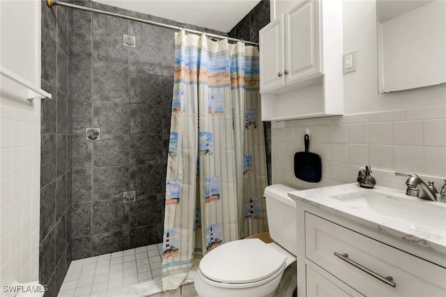 5251-5253 Serenity Cv, Bokeelia, FL 33922 - full bathroom featuring tile walls, vanity, and a tile shower