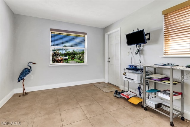 5251-5253 Serenity Cv, Bokeelia, FL 33922 - foyer featuring plenty of natural light and tile patterned floors
