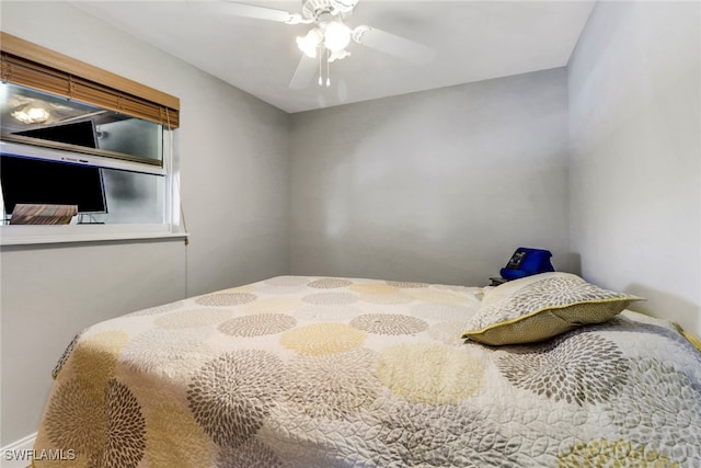 5251-5253 Serenity Cv, Bokeelia, FL 33922 - bedroom with a ceiling fan