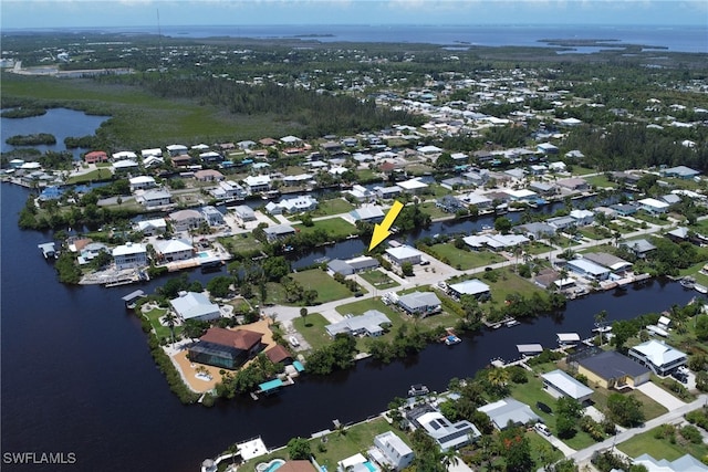 5251-5253 Serenity Cv, Bokeelia, FL 33922 - aerial overview of property's location featuring a large body of water and nearby suburban area