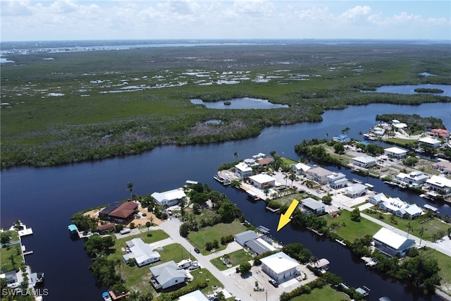 5251-5253 Serenity Cv, Bokeelia, FL 33922 - aerial view of residential area with a large body of water