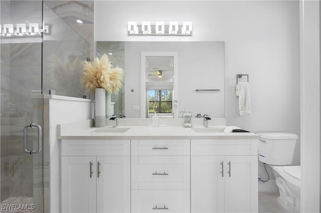 4325 47th Ave NE, Naples, FL 34120 - bathroom with double vanity, a stall shower, and a ceiling fan