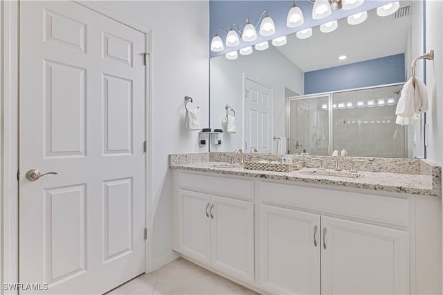 4209 Bloomfield St, Fort Myers, FL 33916 - full bathroom featuring double vanity, a shower stall, and tile patterned flooring