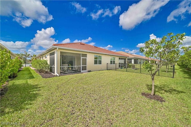 4209 Bloomfield St, Fort Myers, FL 33916 - back of house featuring a tiled roof, stucco siding, and a sunroom