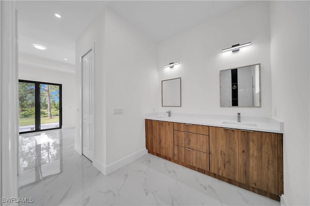 3513 36th St SW, Lehigh Acres, FL 33976 - full bath featuring double vanity, marble finish floors, and recessed lighting