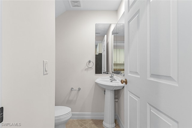 16142 Via Solera Cir Unit 103, Fort Myers, FL 33908 - bathroom with toilet and tile patterned floors