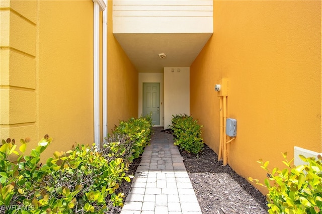 16142 Via Solera Cir Unit 103, Fort Myers, FL 33908 - view of exterior entry featuring stucco siding