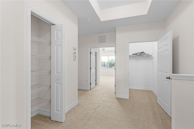 16142 Via Solera Cir Unit 103, Fort Myers, FL 33908 - hallway featuring light carpet and a skylight
