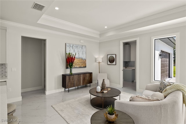 3587 18th Ave SE, Naples, FL 34117 - living area with light marble finish flooring, recessed lighting, ornamental molding, and a raised ceiling