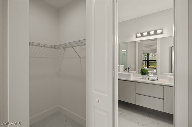 3587 18th Ave SE, Naples, FL 34117 - spacious closet with light marble finish floors