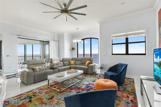 11640 Court Of Palms Unit 602, Fort Myers, FL 33908 - living area featuring ornamental molding, a ceiling fan, plenty of natural light, a chandelier, and light tile patterned floors