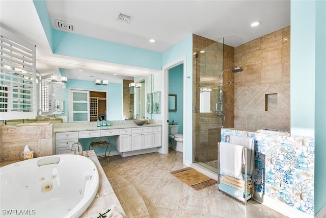 11640 Court Of Palms Unit 602, Fort Myers, FL 33908 - full bathroom with a stall shower, vanity, a jetted tub, and recessed lighting
