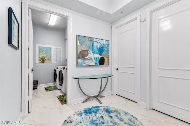 11640 Court Of Palms Unit 602, Fort Myers, FL 33908 - laundry room featuring marble finish flooring and washer and clothes dryer