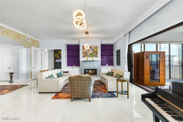 11640 Court Of Palms Unit 602, Fort Myers, FL 33908 - living room with a tiled fireplace, light marble finish flooring, and crown molding