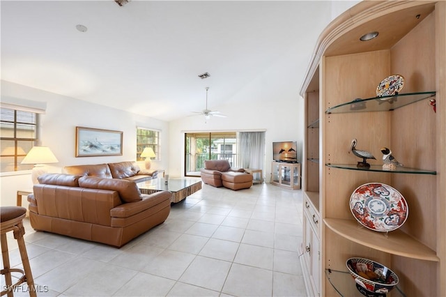 2852 Aintree Ln Unit K201, Naples, FL 34112 - living room with light tile patterned flooring, ceiling fan, and lofted ceiling