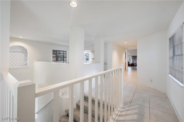 2852 Aintree Ln Unit K201, Naples, FL 34112 - corridor featuring an upstairs landing, light tile patterned flooring, and recessed lighting