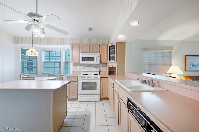 2852 Aintree Ln Unit K201, Naples, FL 34112 - kitchen featuring white appliances, light tile patterned floors, light countertops, light brown cabinetry, and recessed lighting