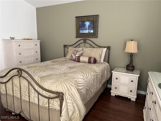 13611 Worthington Way Unit 1307, Bonita Springs, FL 34135 - bedroom with dark wood-type flooring and baseboards