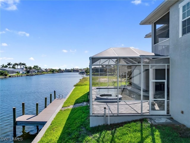 2705 SW 30th Ter, Cape Coral, FL 33914 - dock with a water view, glass enclosure, and a lawn
