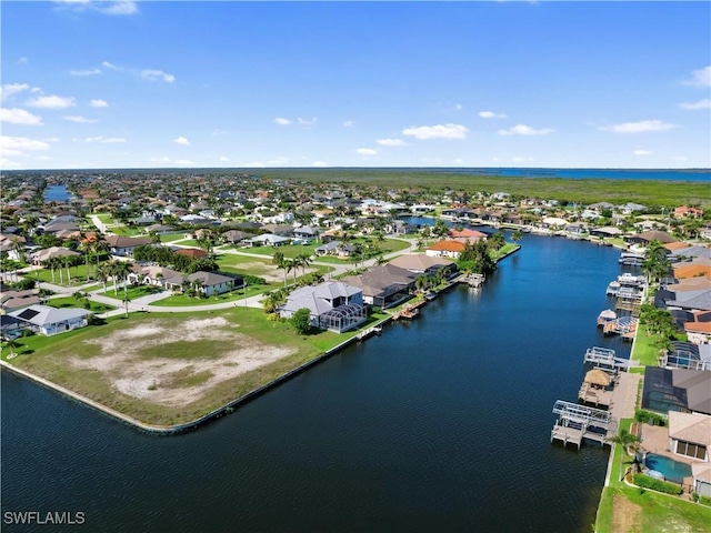 2705 SW 30th Ter, Cape Coral, FL 33914 - aerial perspective of suburban area featuring a nearby body of water