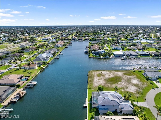 2705 SW 30th Ter, Cape Coral, FL 33914 - aerial perspective of suburban area with a nearby body of water