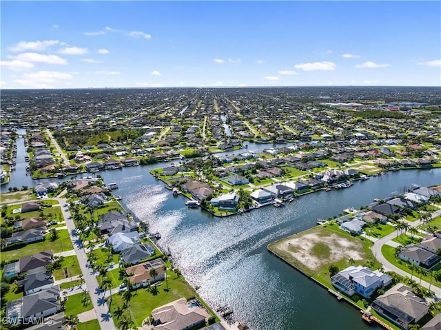 2705 SW 30th Ter, Cape Coral, FL 33914 - aerial perspective of suburban area featuring a nearby body of water