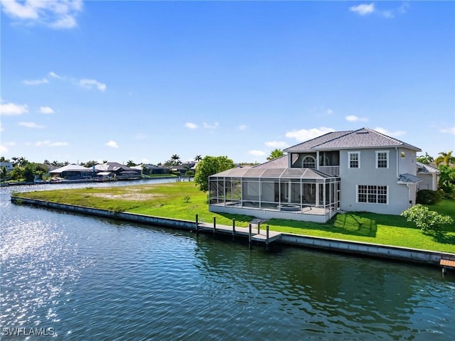 2705 SW 30th Ter, Cape Coral, FL 33914 - dock area with a water view, a yard, and glass enclosure