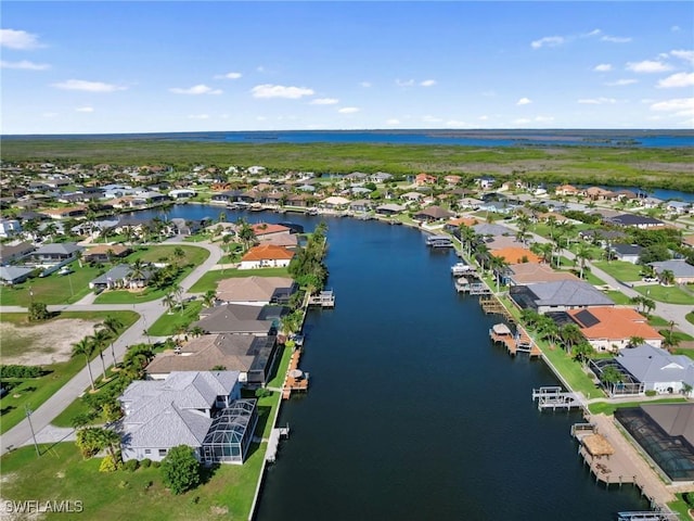 2705 SW 30th Ter, Cape Coral, FL 33914 - aerial overview of property's location with nearby suburban area and a nearby body of water