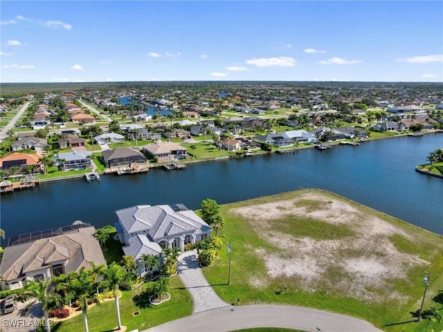 2705 SW 30th Ter, Cape Coral, FL 33914 - aerial perspective of suburban area with a nearby body of water