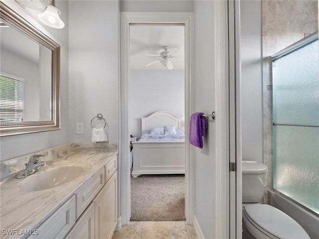2705 SW 30th Ter, Cape Coral, FL 33914 - full bath with ensuite bath, vanity, a shower with door, and a ceiling fan