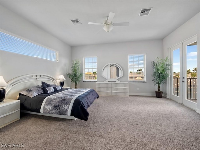 2705 SW 30th Ter, Cape Coral, FL 33914 - bedroom featuring access to outside, multiple windows, carpet, and a ceiling fan