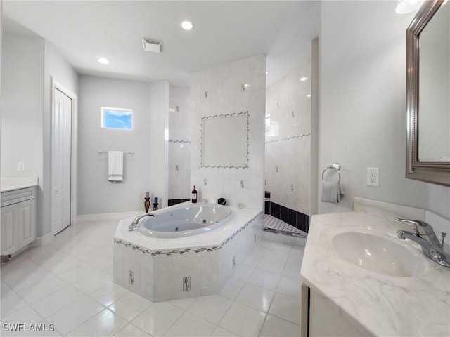 2705 SW 30th Ter, Cape Coral, FL 33914 - full bathroom with vanity, a jetted tub, tile patterned floors, a tile shower, and recessed lighting
