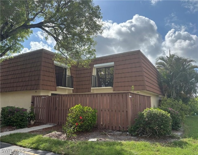 5245 Cedarbend Dr Unit 4, Fort Myers, FL 33919 - view of front of home with mansard roof