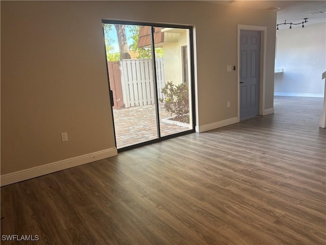 5245 Cedarbend Dr Unit 4, Fort Myers, FL 33919 - unfurnished room with wood finished floors and baseboards