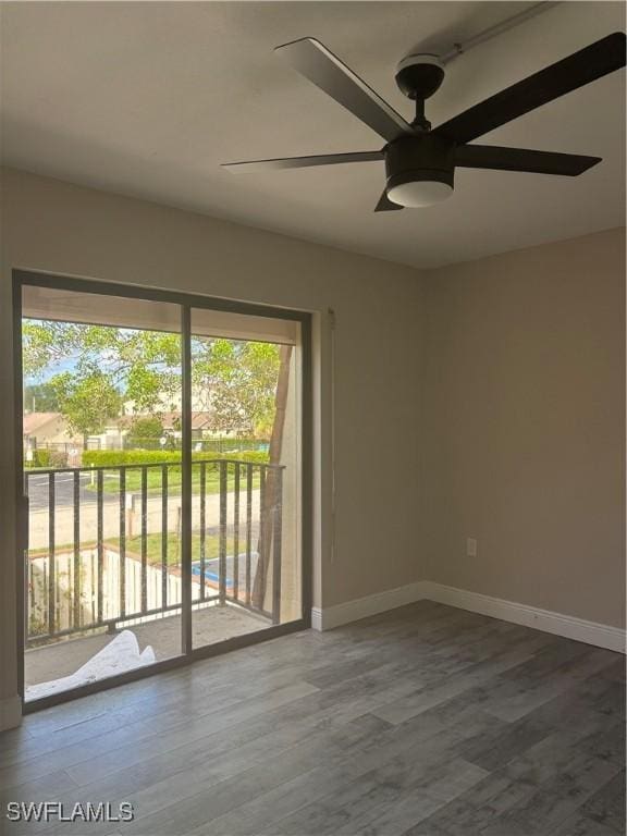 5245 Cedarbend Dr Unit 4, Fort Myers, FL 33919 - empty room with plenty of natural light, a ceiling fan, and wood finished floors
