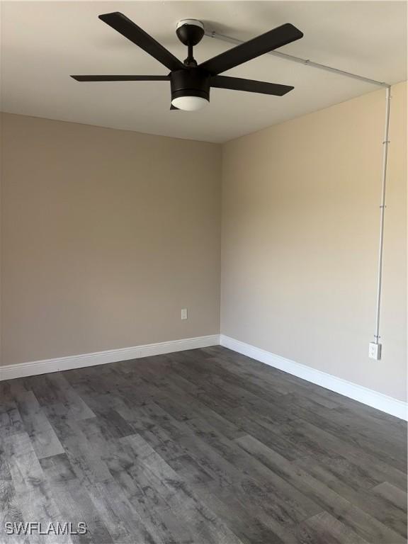 5245 Cedarbend Dr Unit 4, Fort Myers, FL 33919 - spare room with ceiling fan and dark wood-style floors