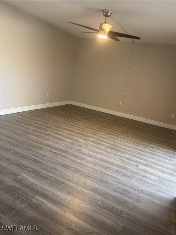 5245 Cedarbend Dr Unit 4, Fort Myers, FL 33919 - spare room featuring dark wood-style flooring and a ceiling fan