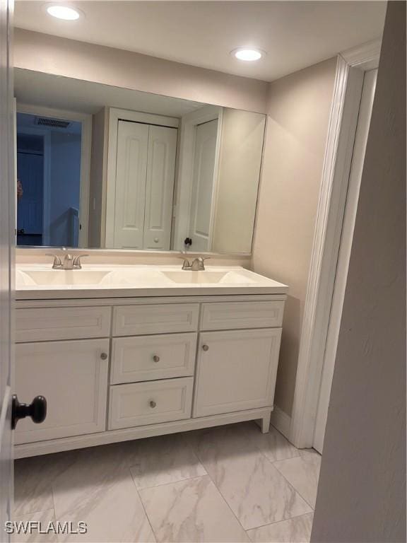 5245 Cedarbend Dr Unit 4, Fort Myers, FL 33919 - full bath with double vanity, marble finish flooring, and recessed lighting