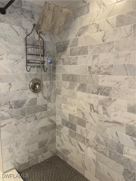 5245 Cedarbend Dr Unit 4, Fort Myers, FL 33919 - full bathroom featuring a tile shower