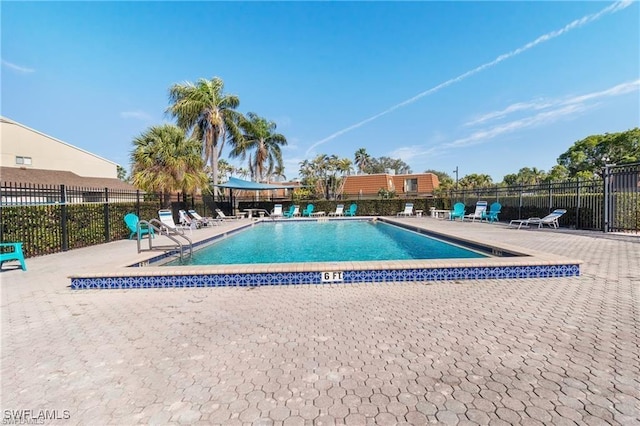 5245 Cedarbend Dr Unit 4, Fort Myers, FL 33919 - community pool with a patio