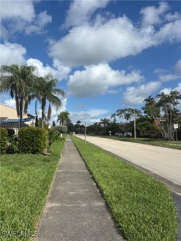 5245 Cedarbend Dr Unit 4, Fort Myers, FL 33919 - view of asphalt street featuring sidewalks